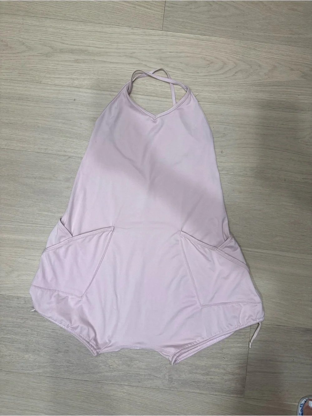 Girls Light Pink Cross-Back One-Piece Bodysuit with Front Pockets